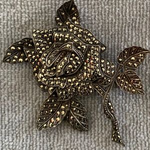 Marcasite rose brooch.  28 grams.  Clasp intact